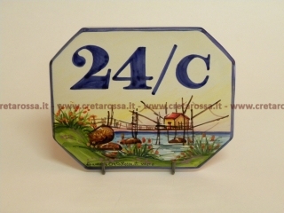 cod.art: nc45 - Mattonella in ceramica ottagonale cm 16x12 circa con trabocco e scritta personalizzata. 